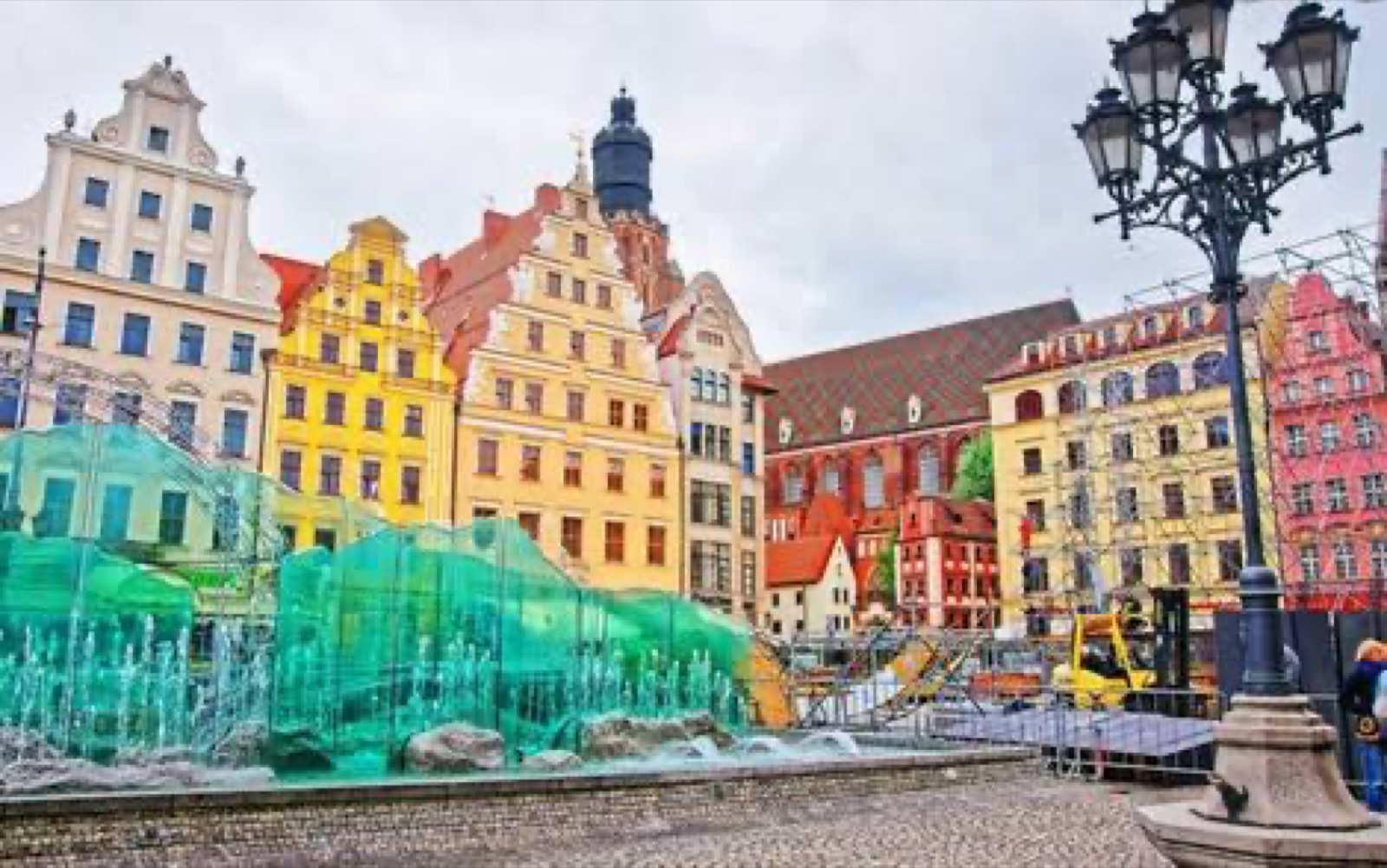 Colourful facades and fountain in the Market Square