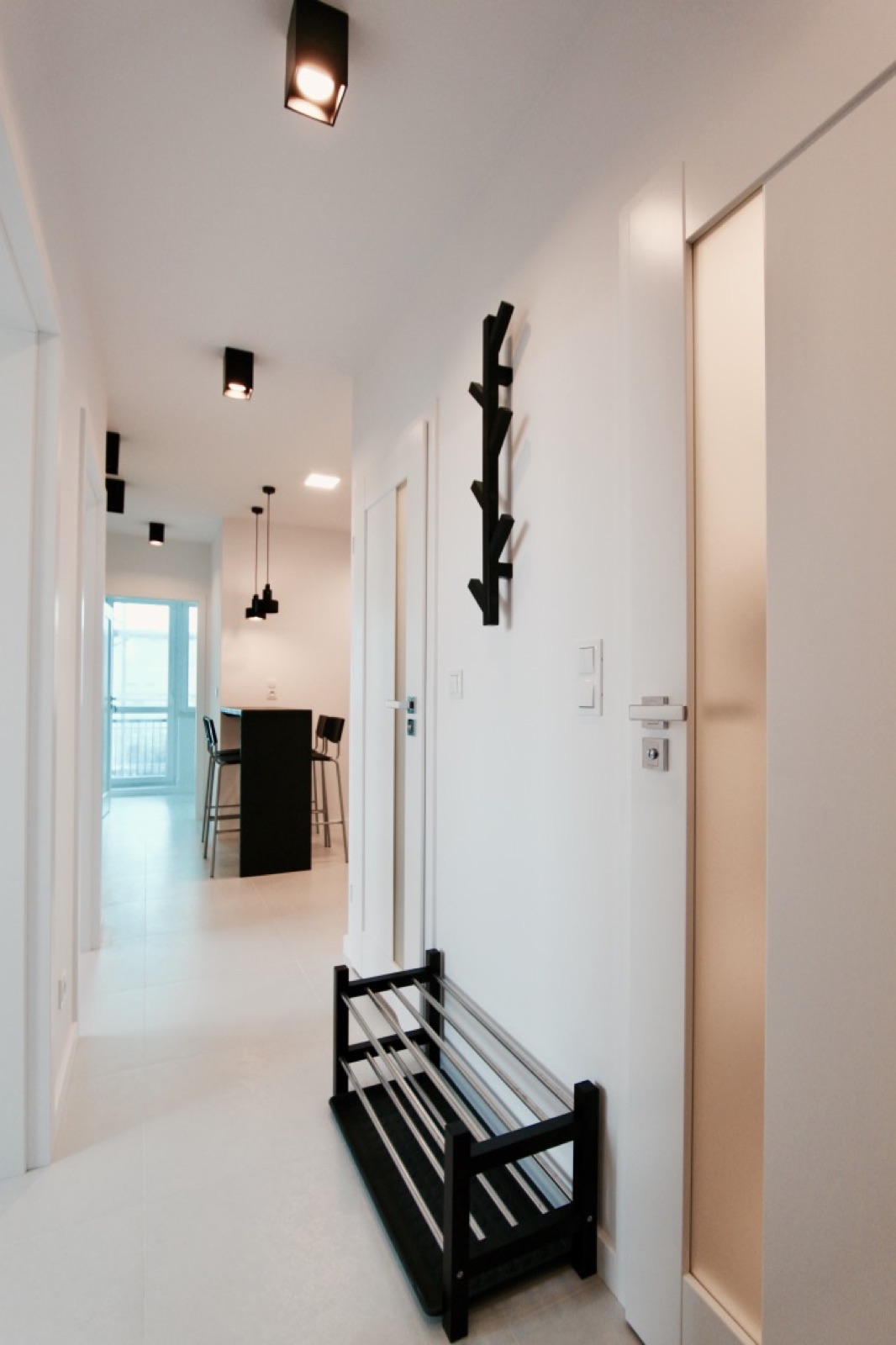 Hallway toward the shared kitchen and breakfast bar