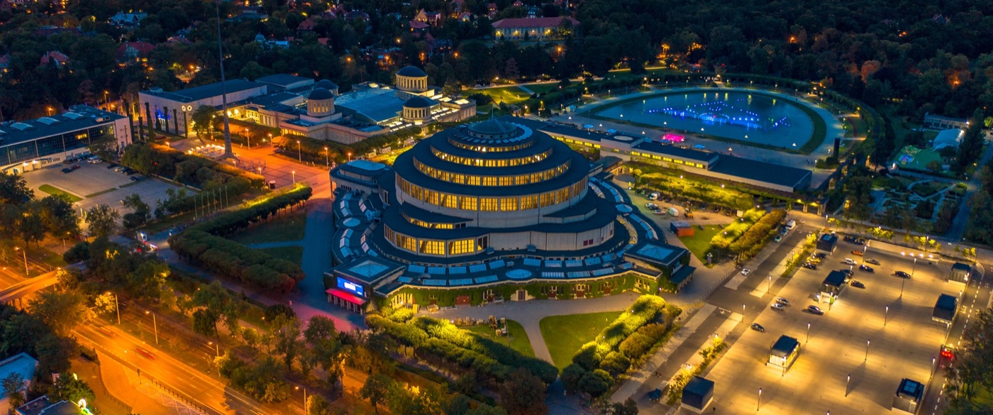 Centennial Hall and its surroundings after dark