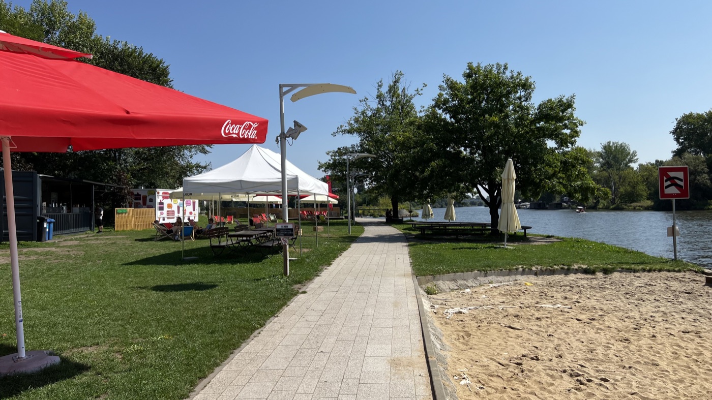 Outdoor café terrace beside the river in Wrocław