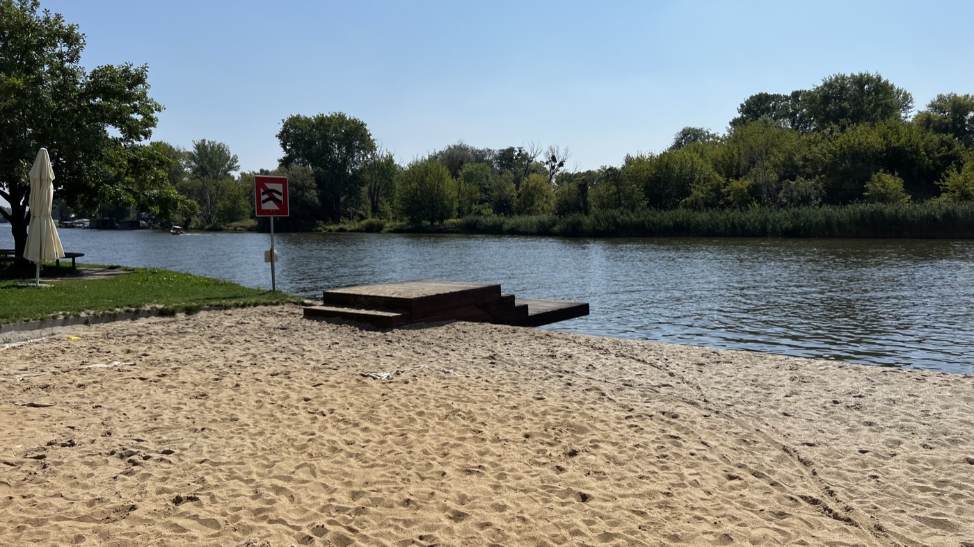 Sandy riverbank and water views